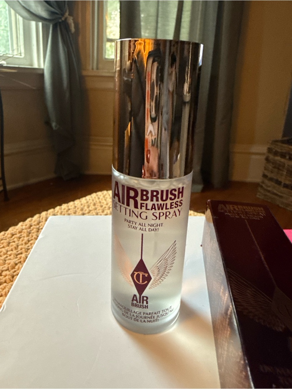 Charlotte Tilbury Airbrush Flawless Setting Spray — Silver Cap, Clear Bottle